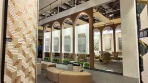Dongxing Group Xiamen Stone Fair 2026 booth with terrazzo walls and arched design.