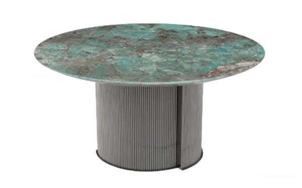 Modern round dining table with turquoise exotic stone top with natural texture, supported by a ribbed fluted metal base, luxury home furniture