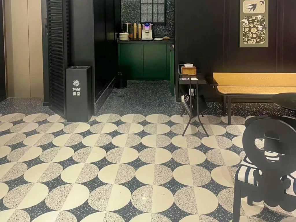 Custom geometric patterned inorganic terrazzo floor, durable decorative flooring for restaurant and hospitality projects
