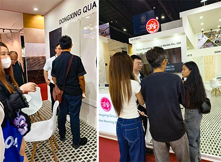 Visitors and clients discussing stone projects at Dongxing booth during Thailand Stone Fair 2026, showcasing precast terrazzo, marble, and quartz solutions for Southeast Asia projects