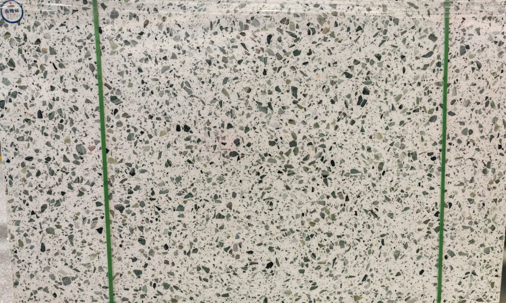 Mass production finished inorganic terrazzo slabs stacked in factory workshop, ready for engineering projects